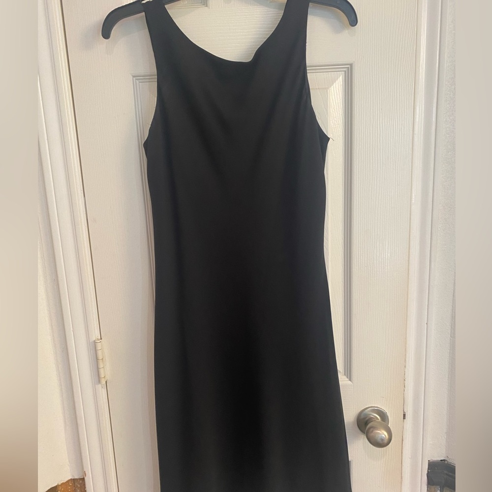 Size 10/11 jump little black dress, perfect addition for your closet!